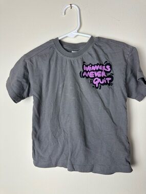 Zara Gray Tee with  'Winners Never Quit' Graphic